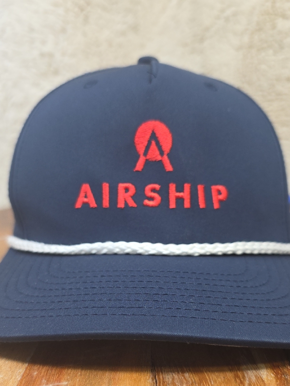 Airship Men's Navy Trucker Hat with Red Logo
